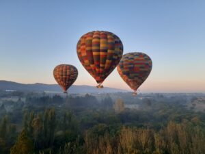 Hot air balloons over Magalies river valley