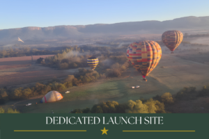Hot air balloons launching from a private balloon safari launch site in the Magalies River Valley