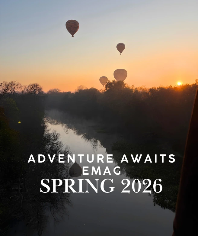 Hot air balloons floating over the Magalies River Valley at sunrise, promoting spring balloon safaris in 2026.